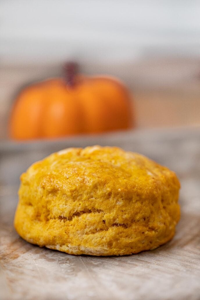 Pumpkin Biscuits with pumpkin in the background