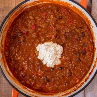 Pumpkin Chili with sour cream topping