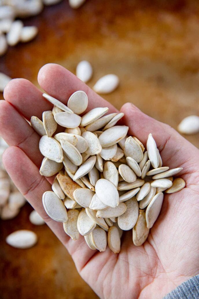 Roasted Pumpkin Seeds held in hand