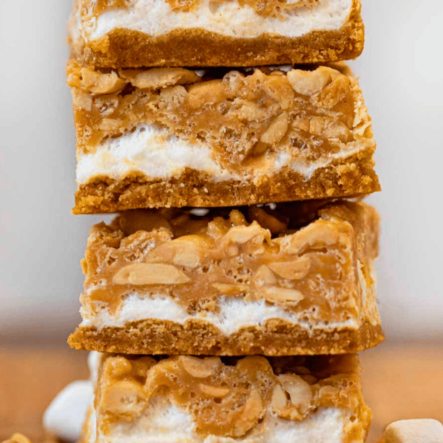 peanut marshmallow dessert squares stacked on one another