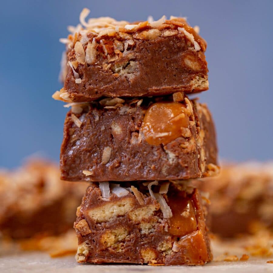 three pieces of Samoa's Cookie Fudge stacked