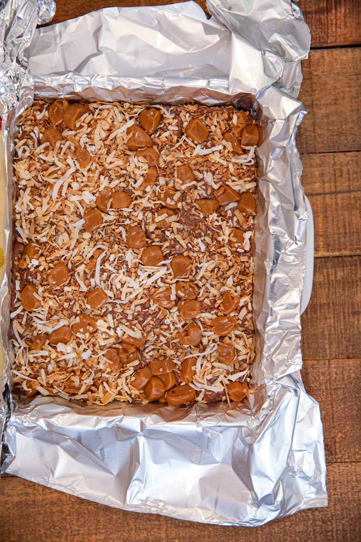 baking dish of Samoa's Cookie Fudge lined with foil