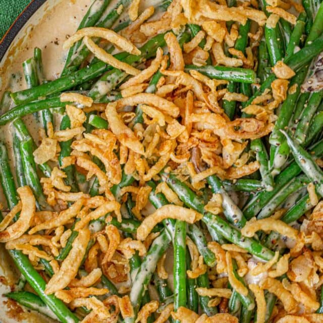 Stovetop Green Bean Casserole in skillet with French onions