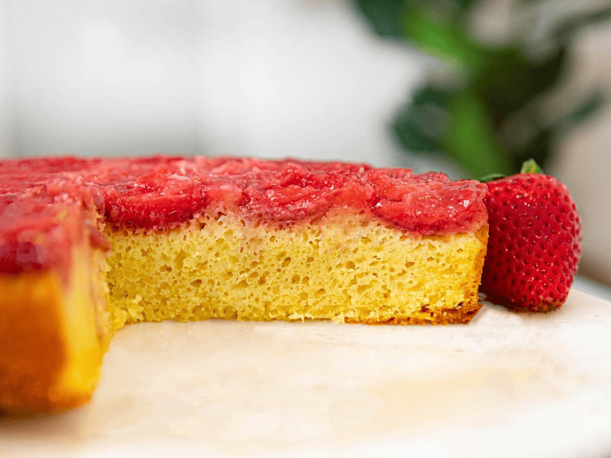 side view of cake with piece missing