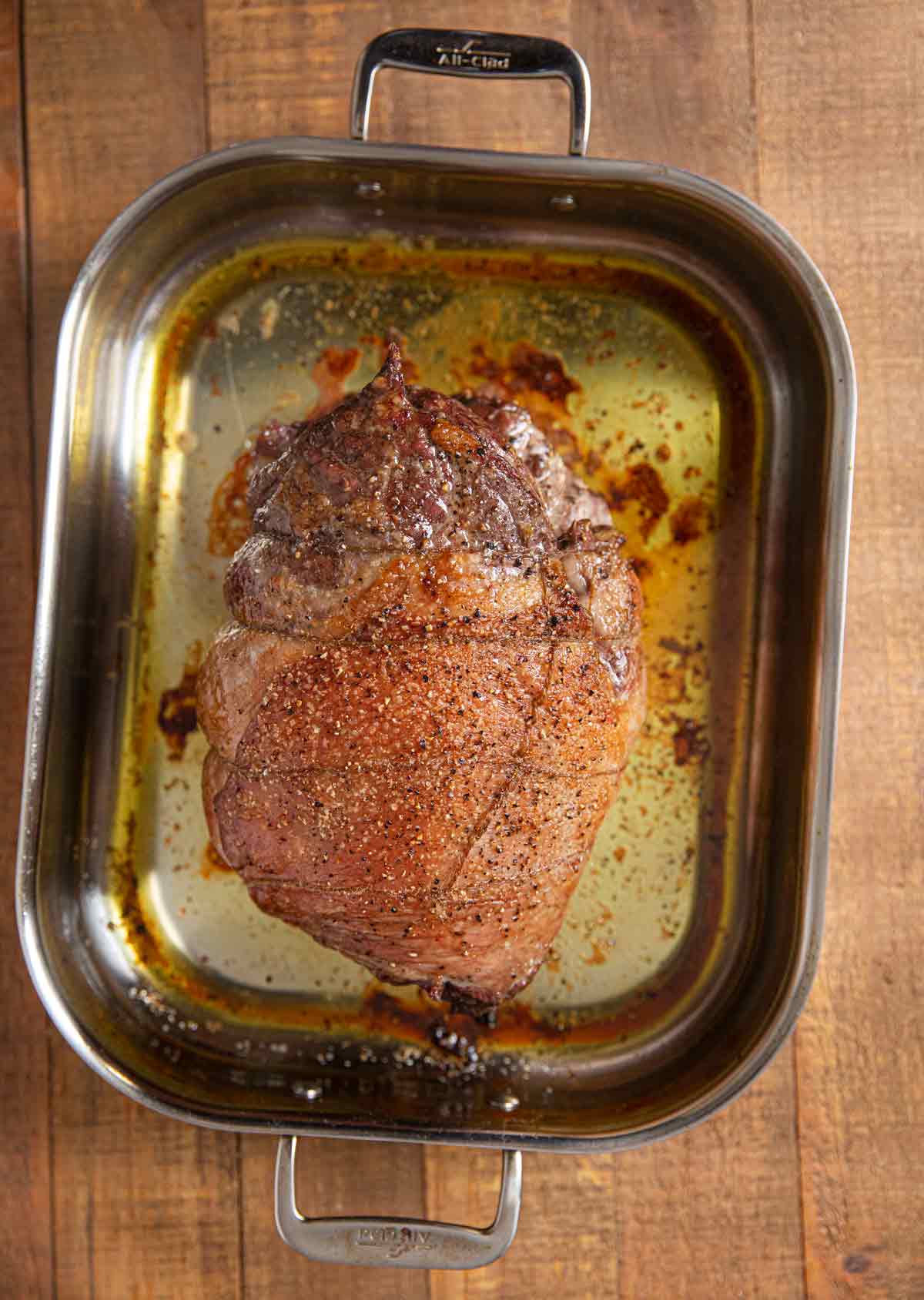 Roasted Stuffed Leg of Lamb in baking pan