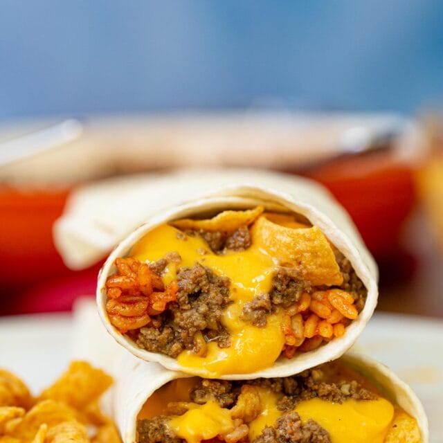 Taco Bell Beefy Fritos Burrito on plate with Fritos