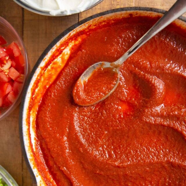 Red Sauce in pot with spoon, 1x1
