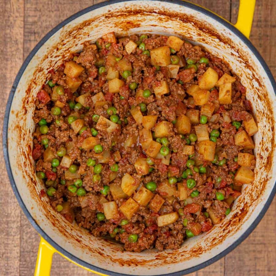 Indian Keema Aloo Beef and Potatoes in yellow pot up close