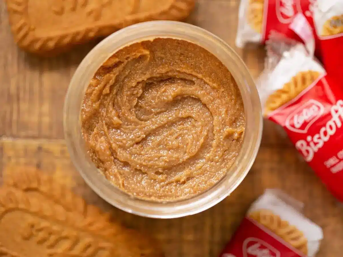 butter swirled in a container with cookies next to it