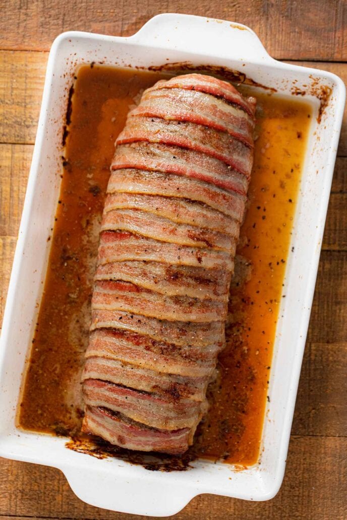 top-down view of Bacon-Wrapped Meatloaf in baking dish