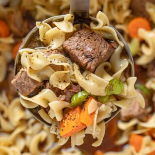 Close up of Beef Soup serving in ladle