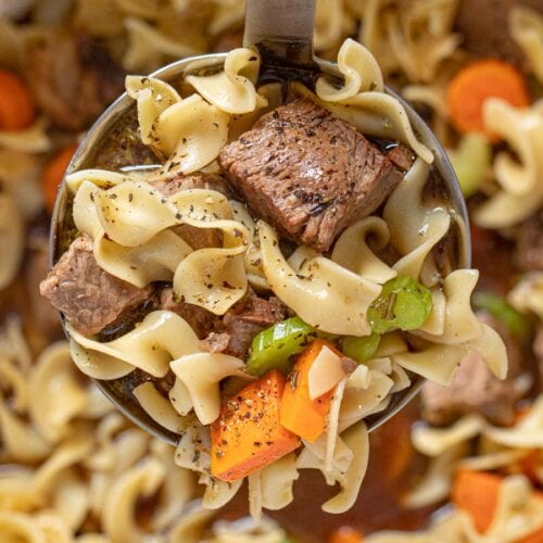 Close up of Beef Soup serving in ladle