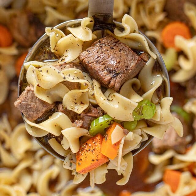 Close up of Beef Soup serving in ladle