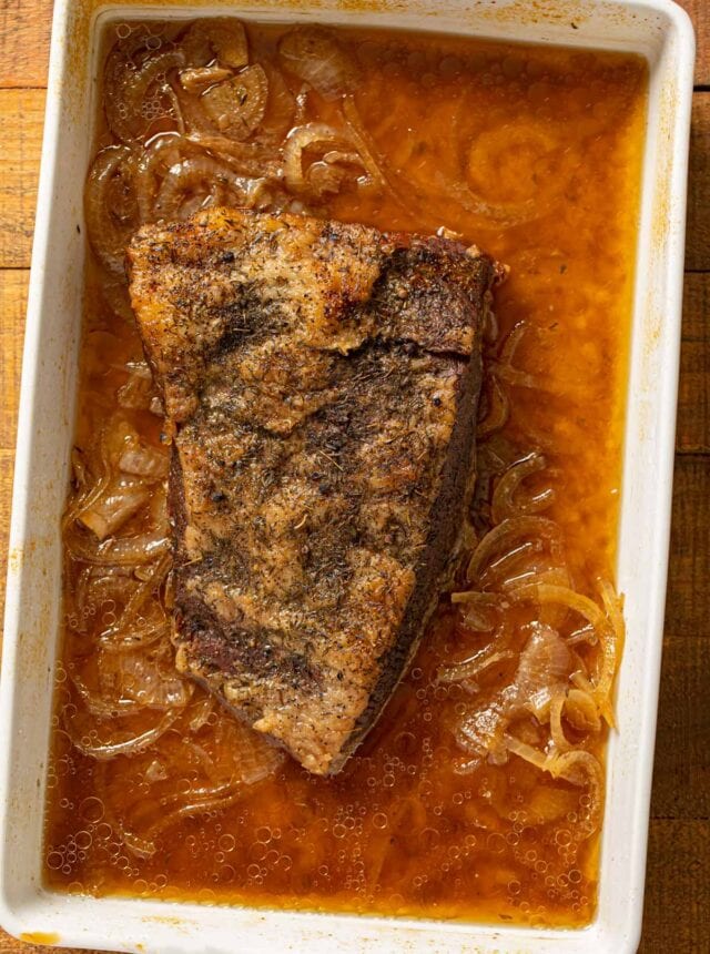 Beer and Onion Brisket in baking pan