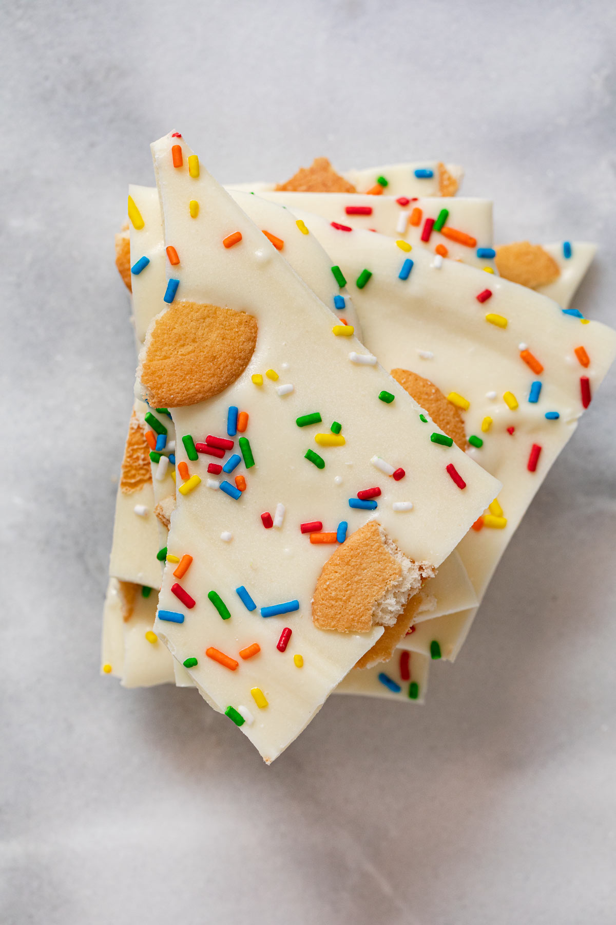 top-down view of Birthday Cake Bark pieces in stack