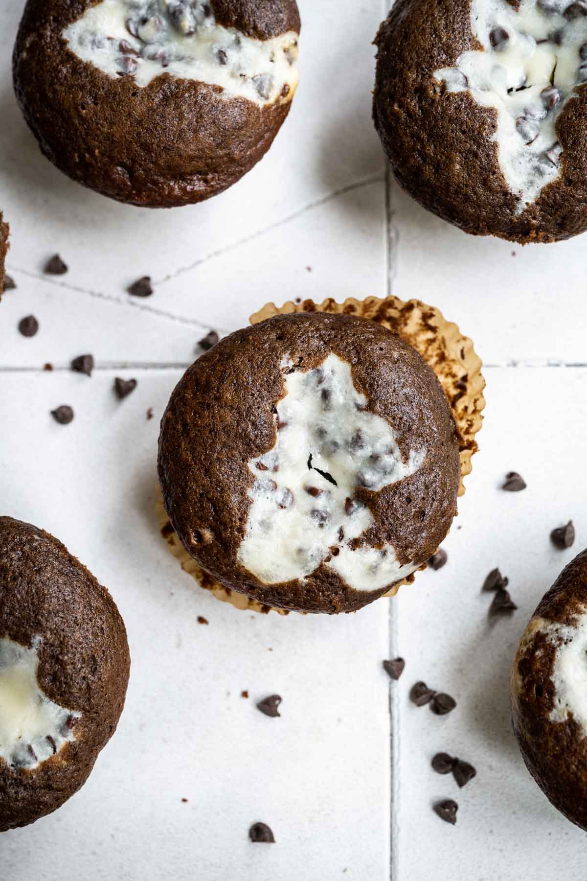 Black Bottom Cupcakes on counter with chocolate chips