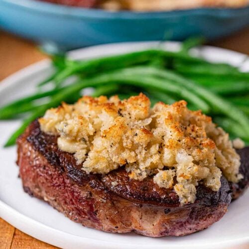 Blue Cheese Crusted Filet Mignon on plate with green beans
