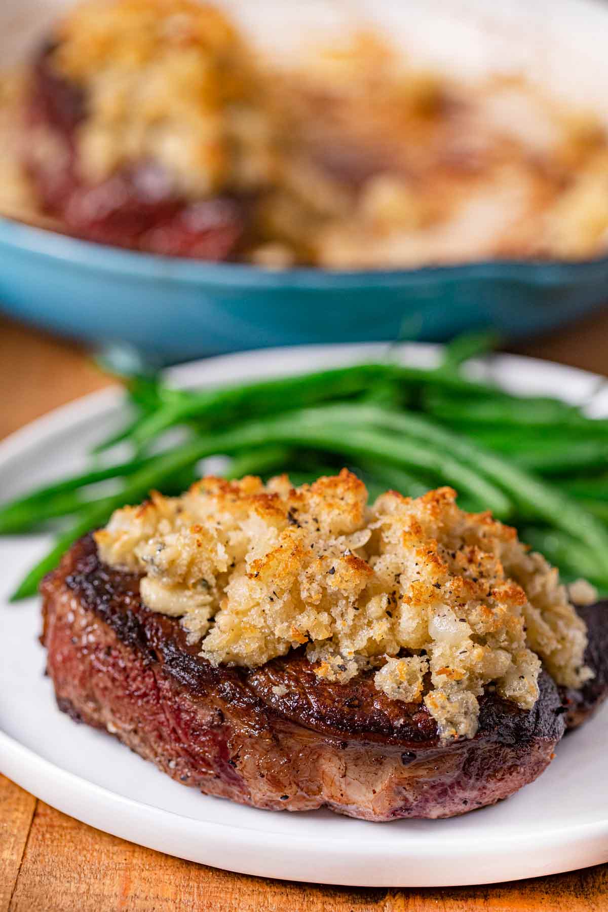 Blue Cheese Crusted Filet Mignon on plate with green beans