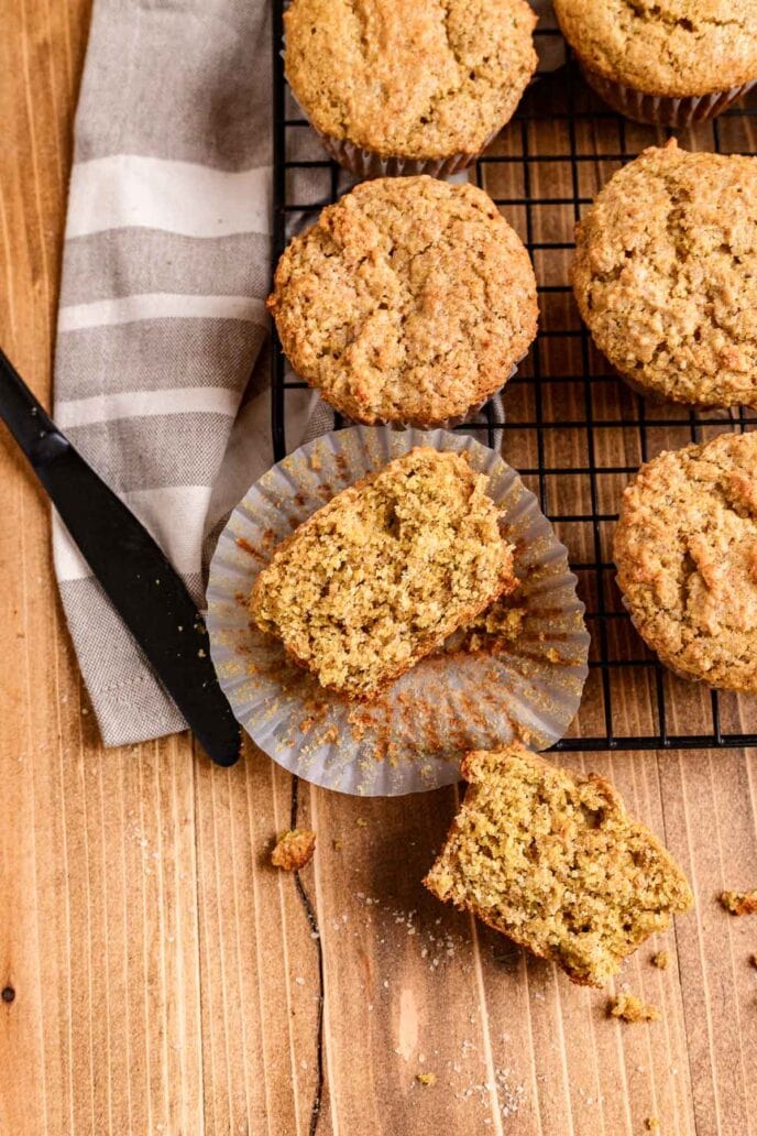 Bran Muffins on wire rack and one cut in half