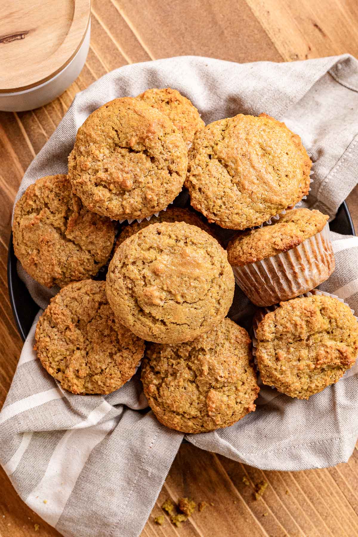 Bran Muffins in linen towel lined bowl