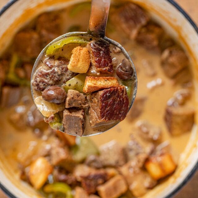 Philly Cheesesteak Soup serving in ladle