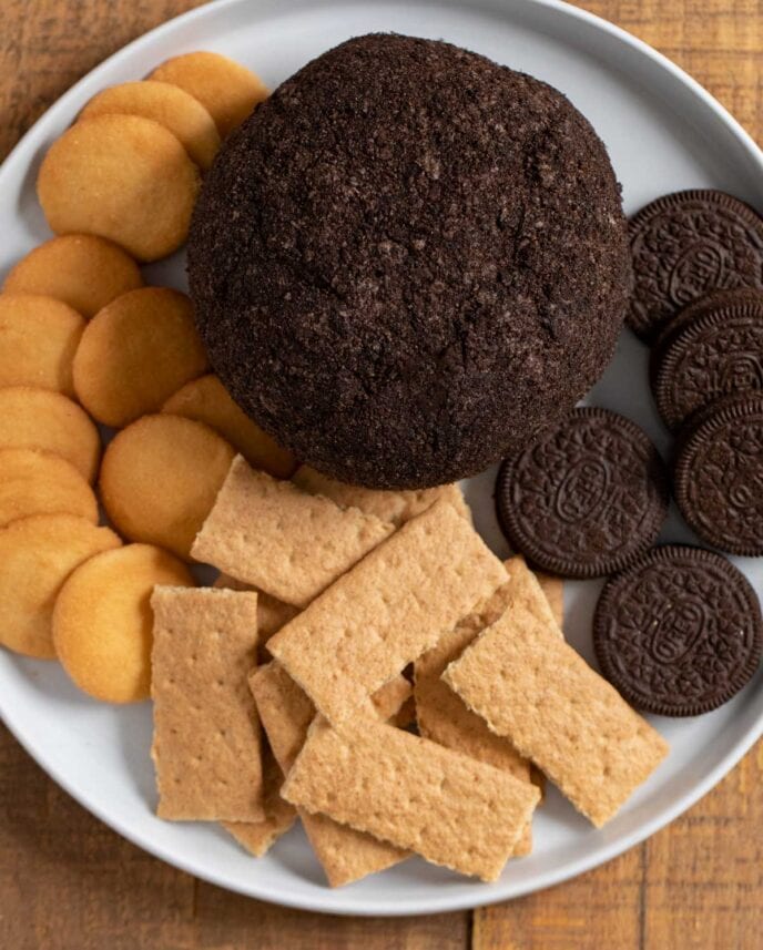 Chocolate Oreo Cheese Ball on plate with cookies