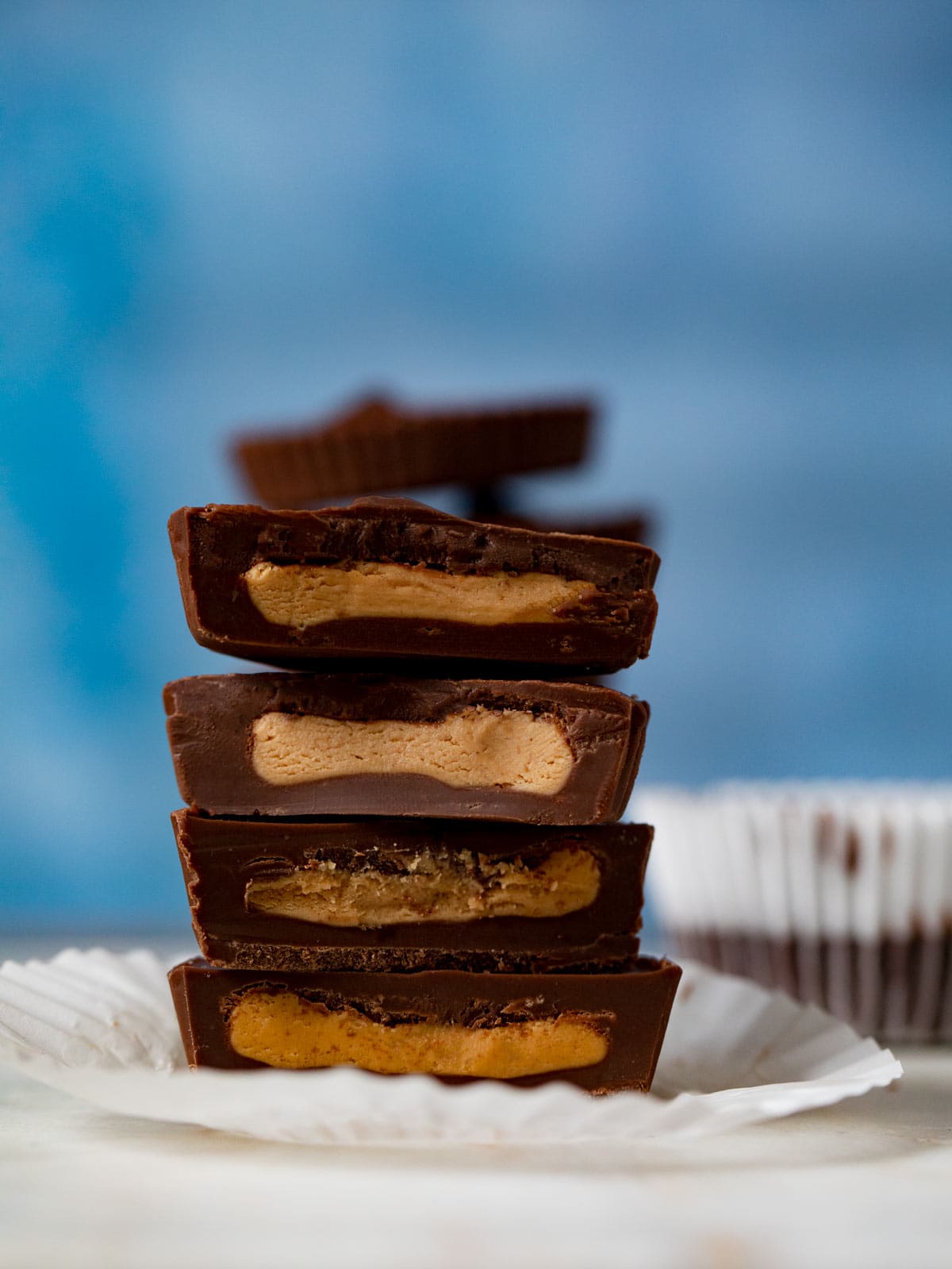 halved Chocolate Peanut Butter Cups in stack