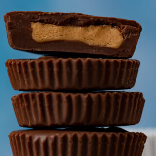 Brownish candy in stack with the top one cut in half
