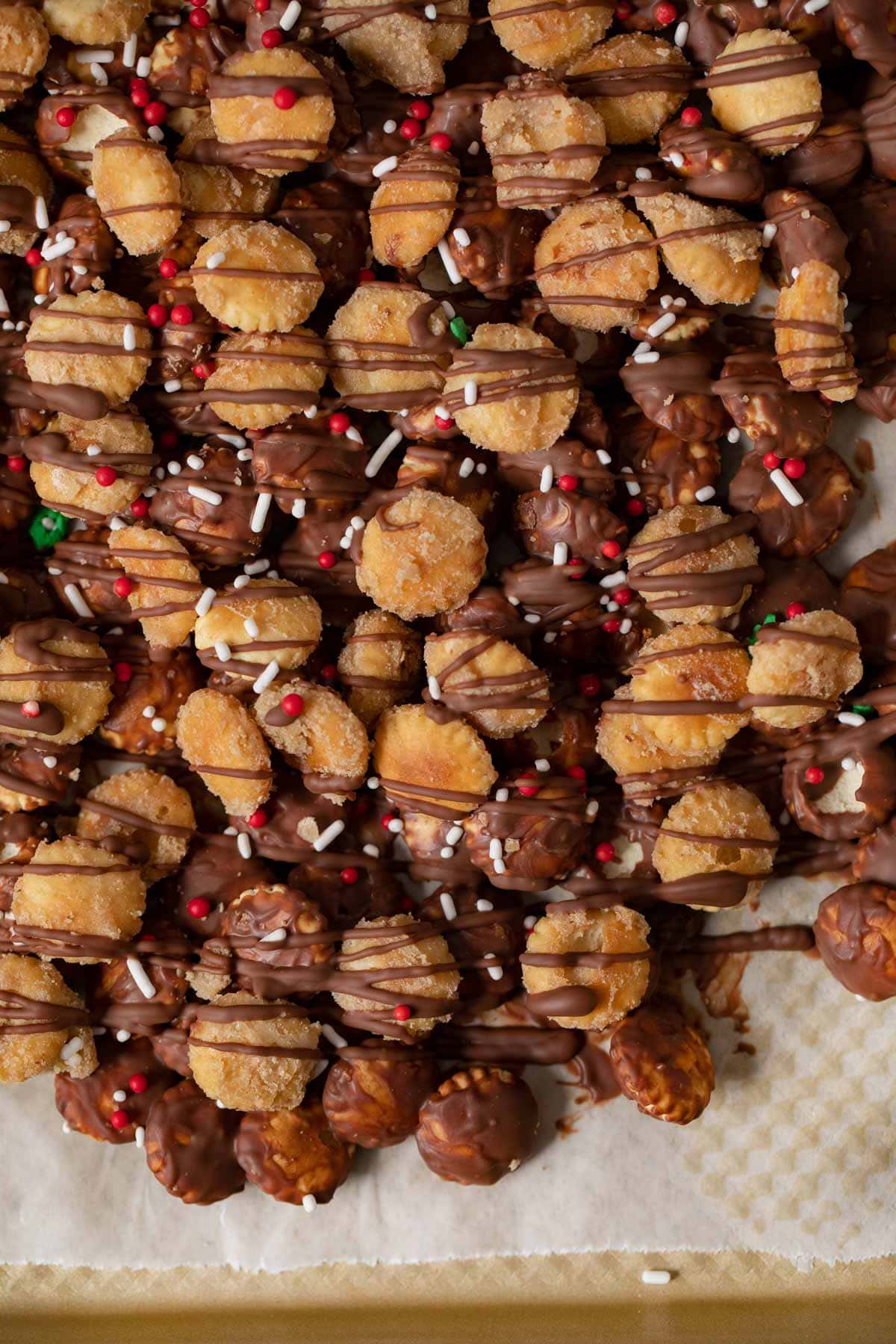 close-up of Christmas Saltine Toffee Snack Mix on baking sheet