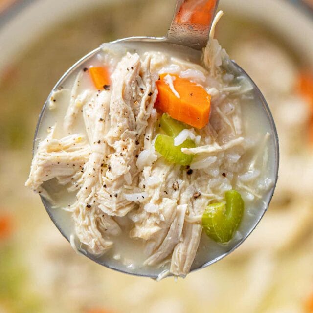 Greek Chicken and Rice Soup (Avgolemono) serving in ladle