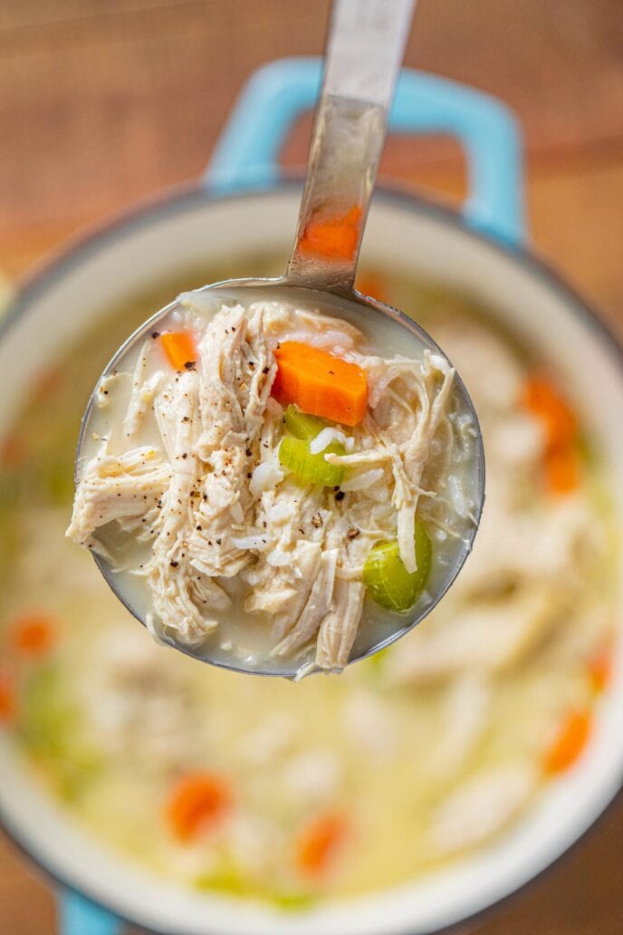 Greek Chicken and Rice Soup (Avgolemono) serving in ladle