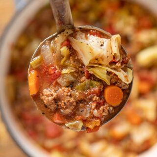 Ground Beef Cabbage Soup serving in ladle