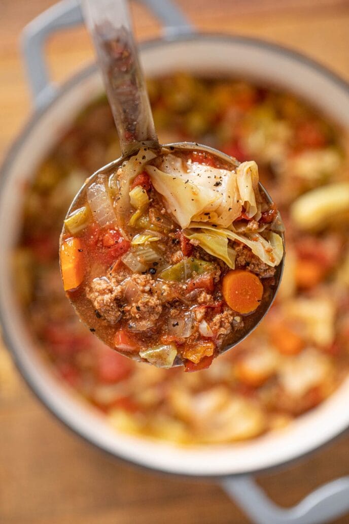 Ground Beef Cabbage Soup serving in ladle