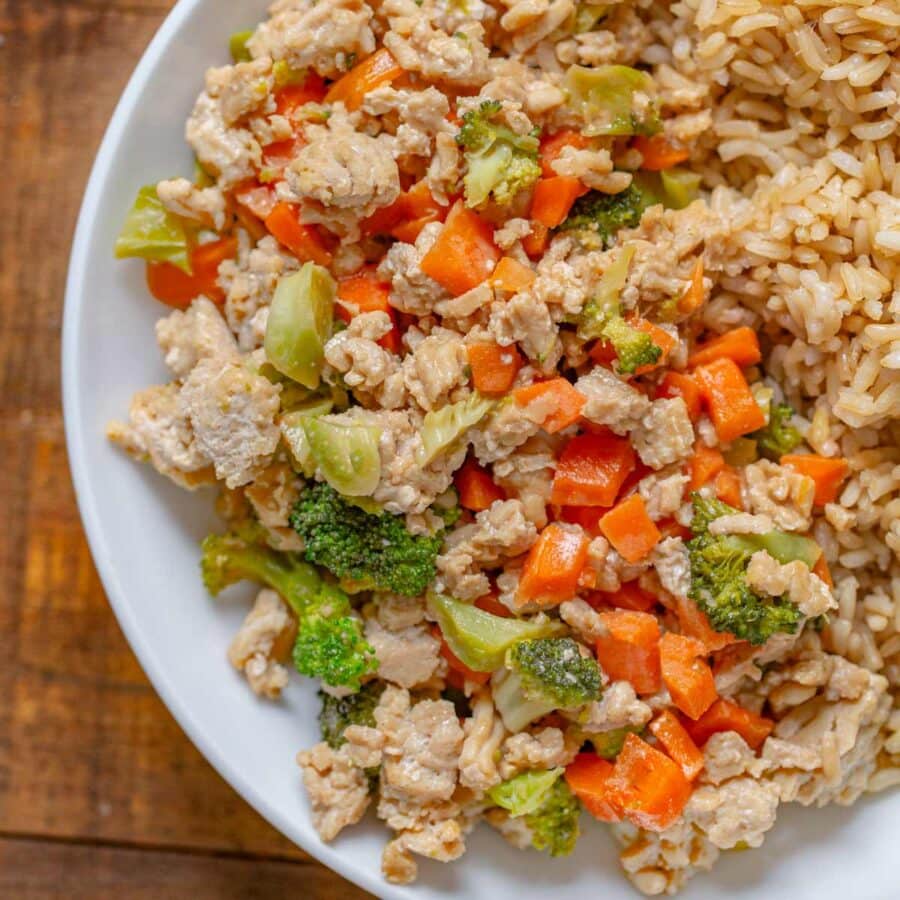 Ground Thai Peanut Chicken on plate with brown rice