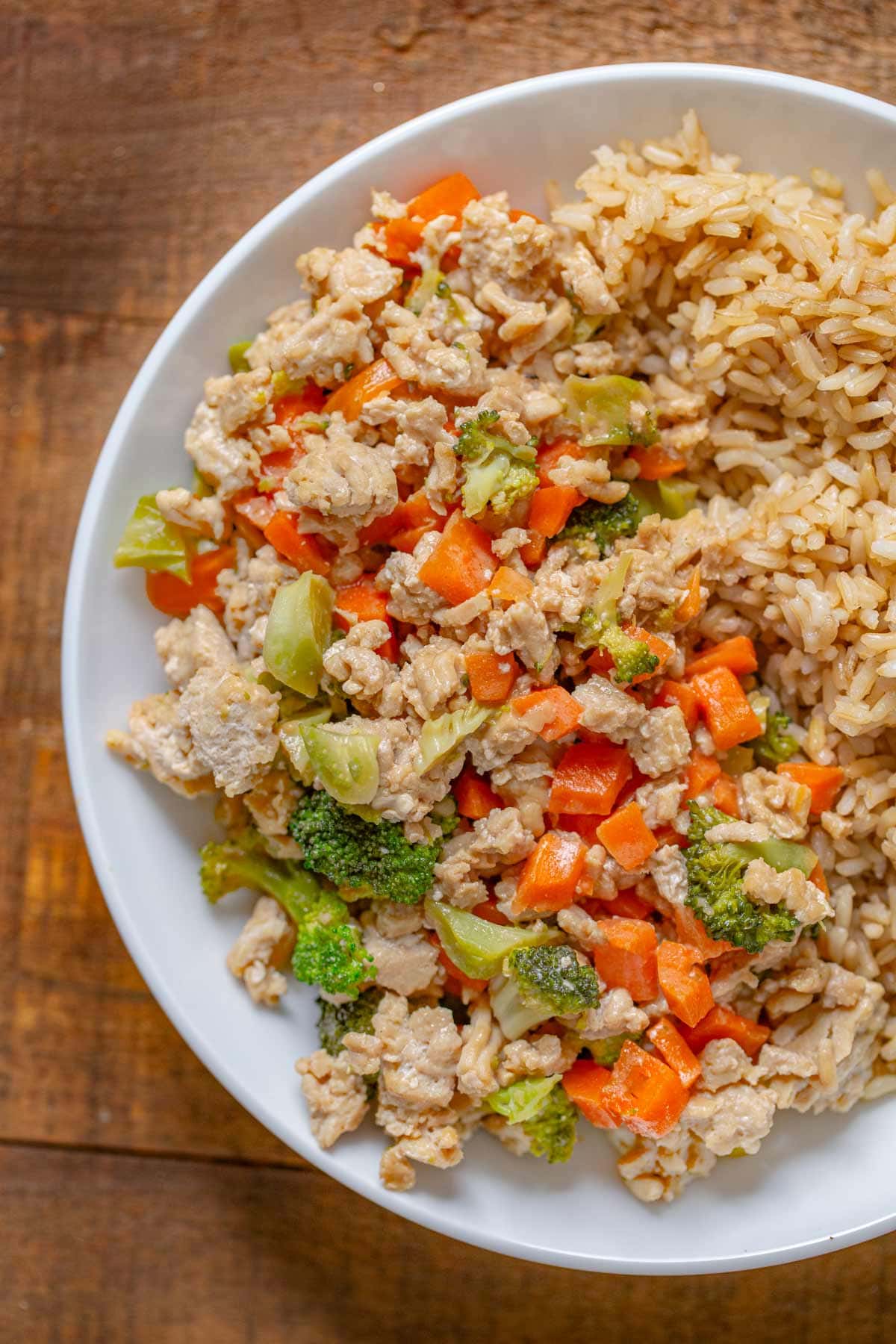 Ground Thai Peanut Chicken on plate with brown rice