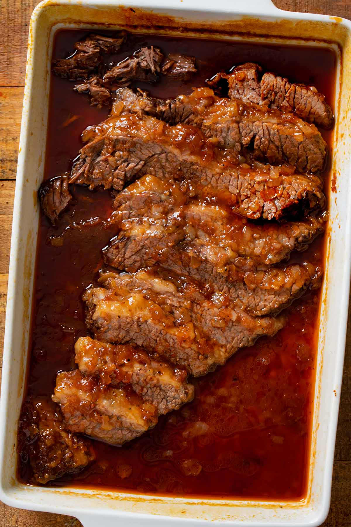 Jewish Sweet and Sour Brisket, sliced in baking dish