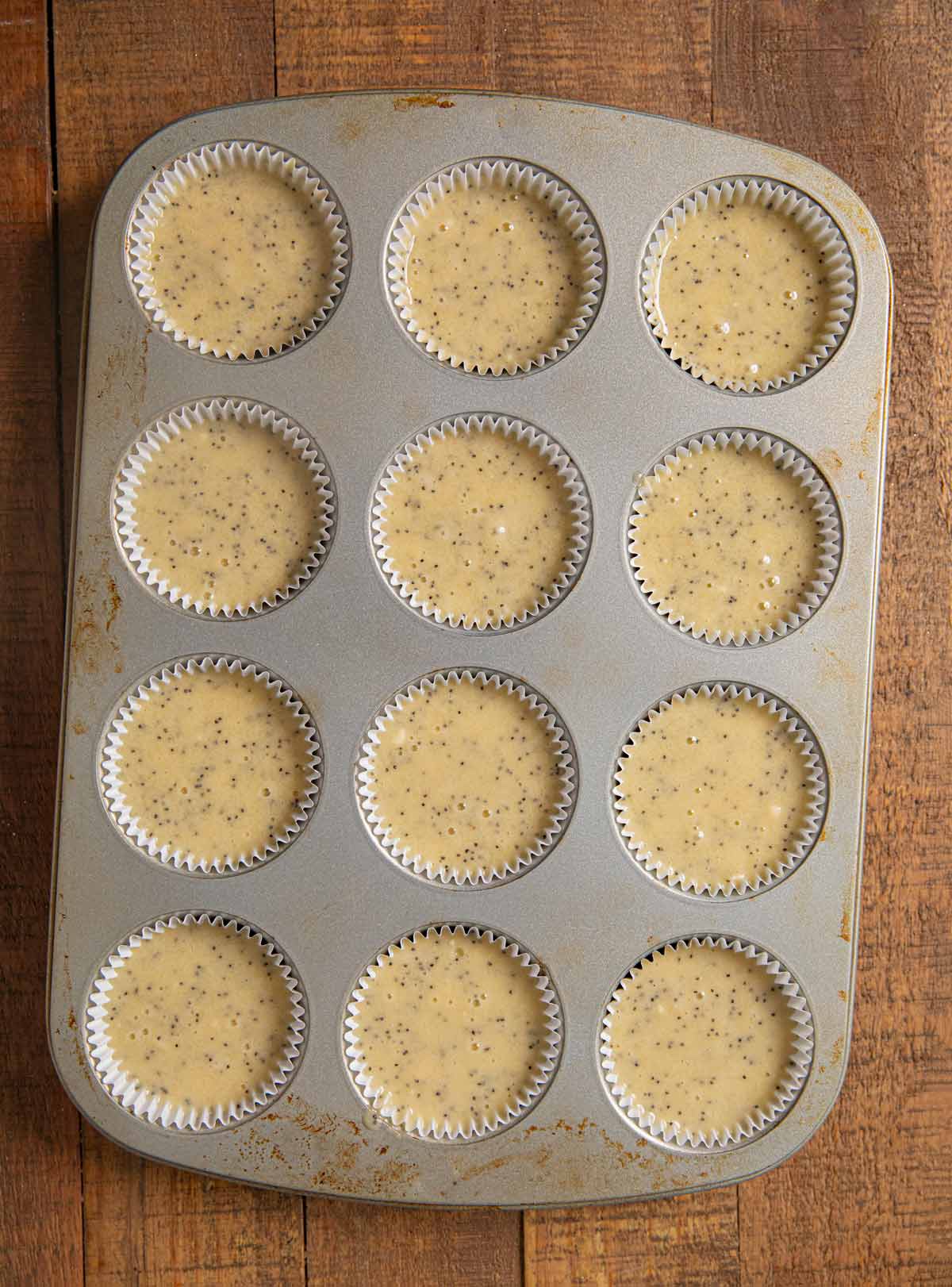 Poppy Seed Muffins in muffin tin before baking