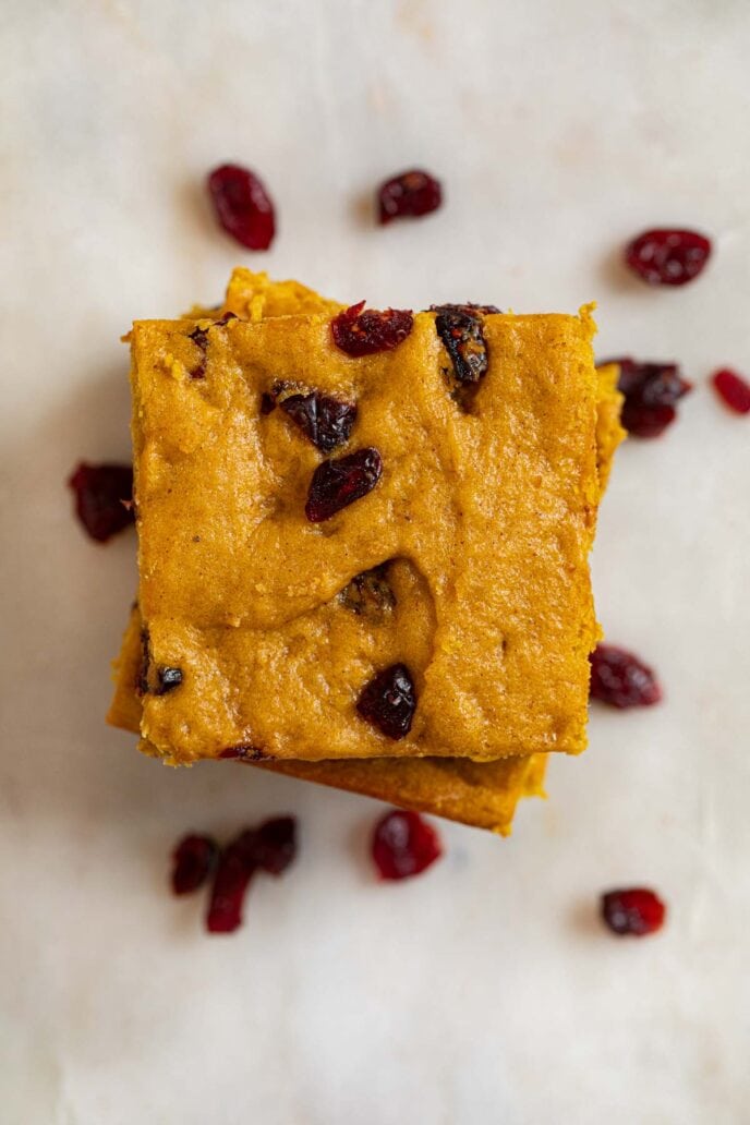 top-down view of Pumpkin Cranberry Bars in stack