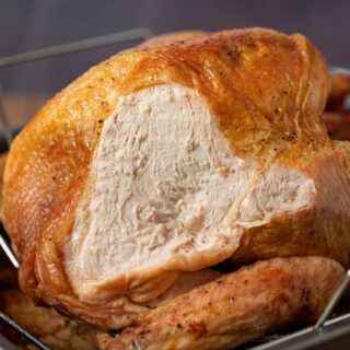 Roast Turkey from Frozen in roasting pan with breast sliced open