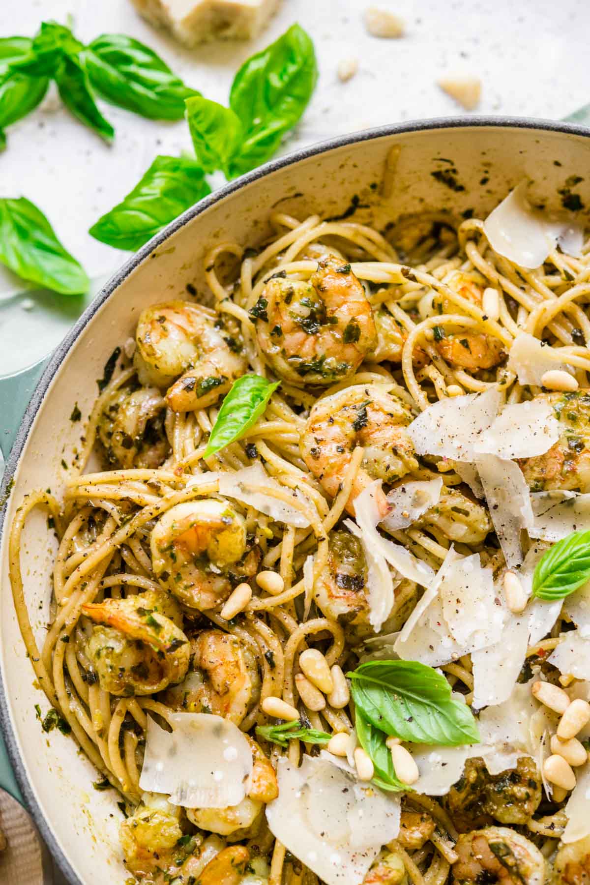 Shrimp Pesto Pasta in mixing bowl