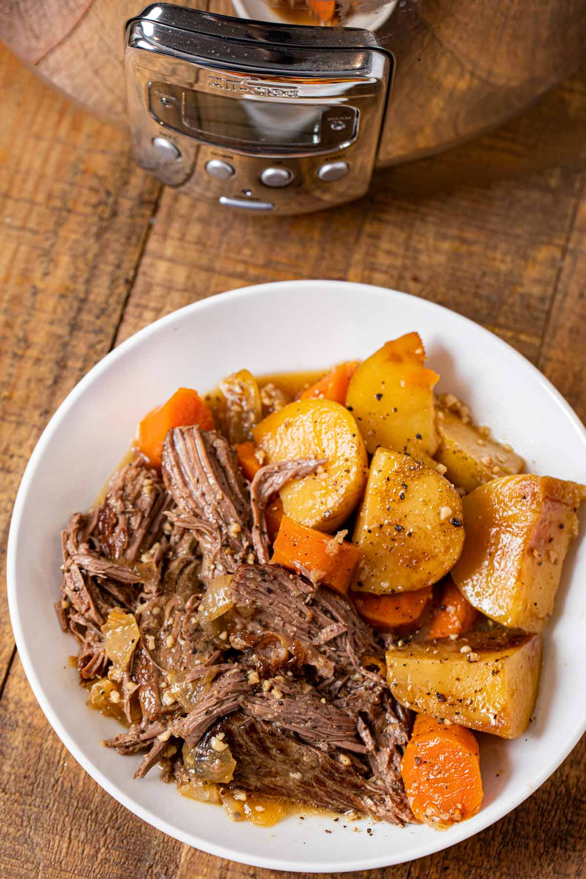 Slow Cooker Rump Roast serving on plate