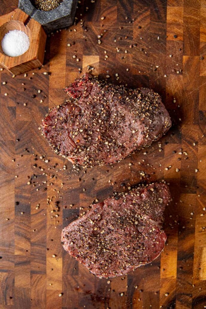 Steak Au Poivre on cutting board before cooking