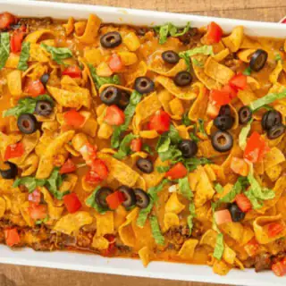 Casserole in baking dish with toppings