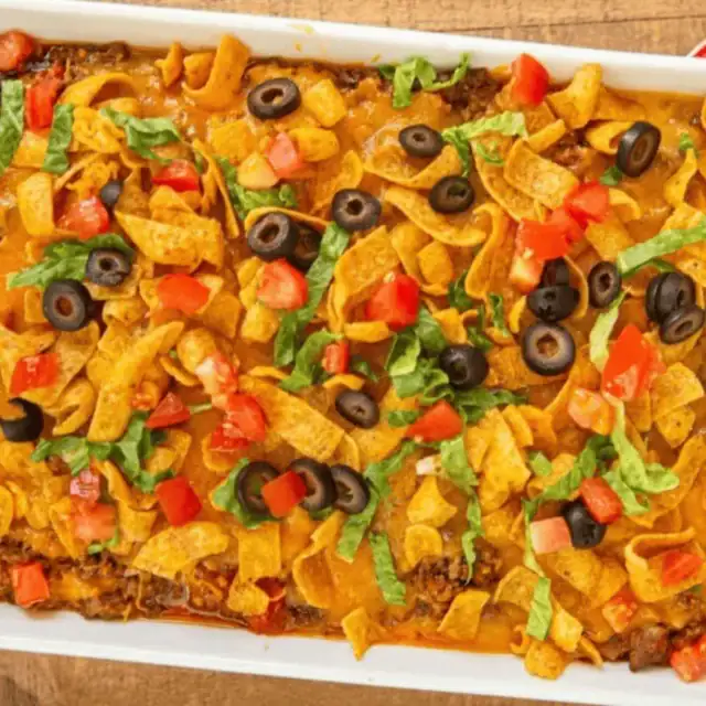 Casserole in baking dish with toppings