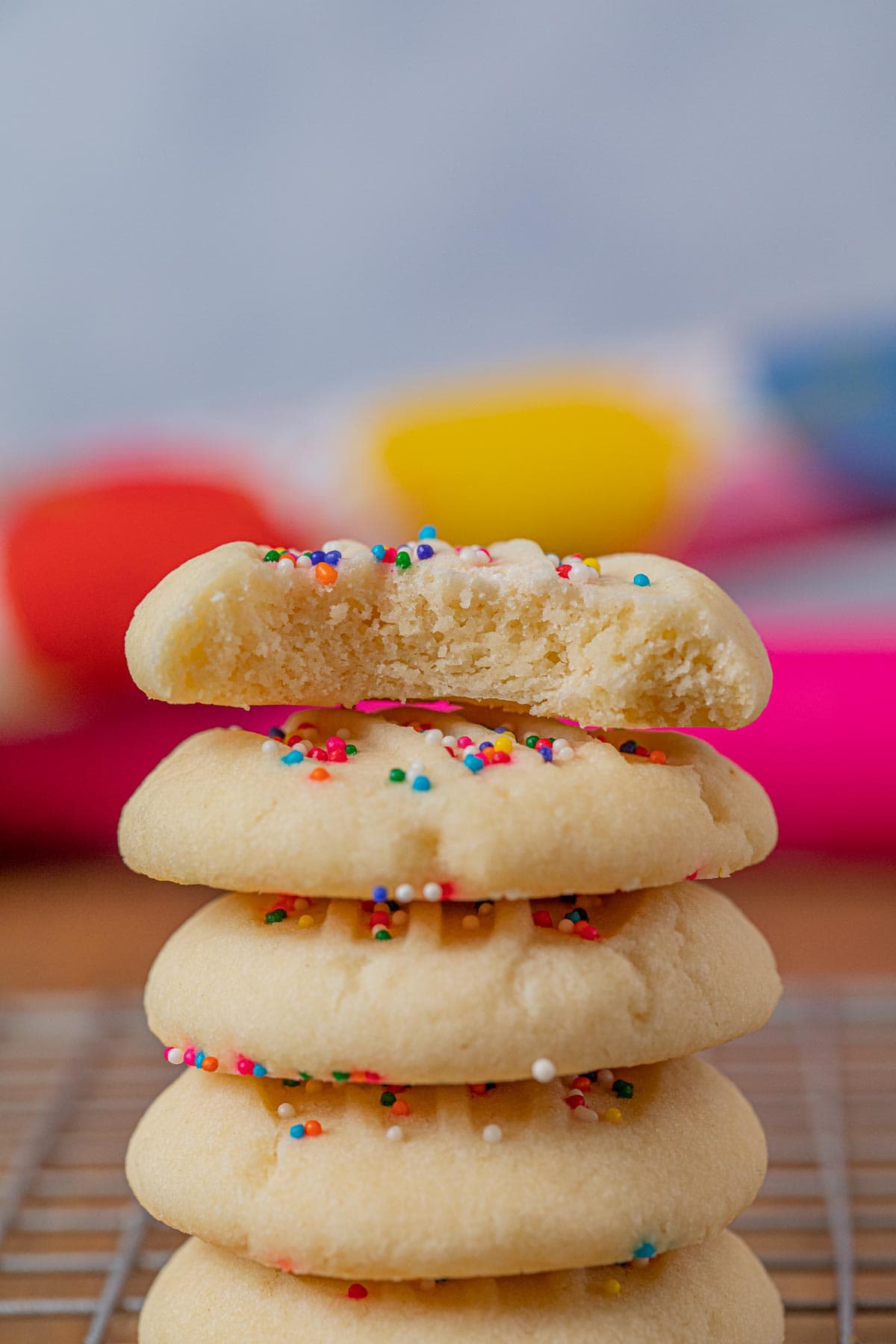 Whipped Shortbread Cookies in stack on wire rack