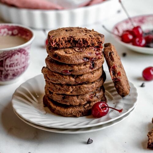 Cherry Chocolate Shortbread Cookies stacked on a plate