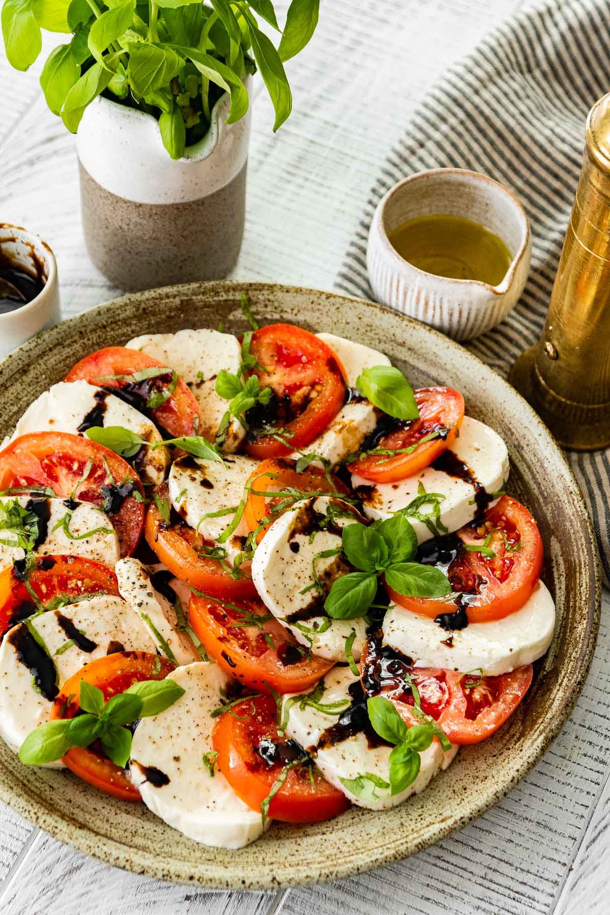 Caprese Salad with Balsamic Reduction on serving plate