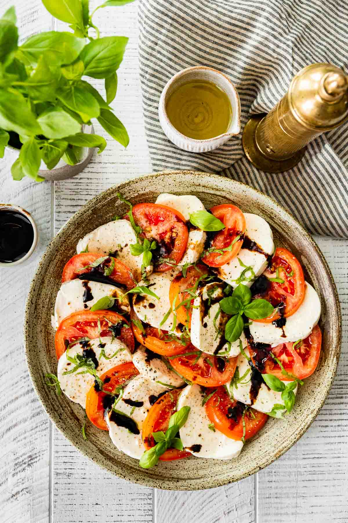 Caprese Salad with Balsamic Reduction on serving plate