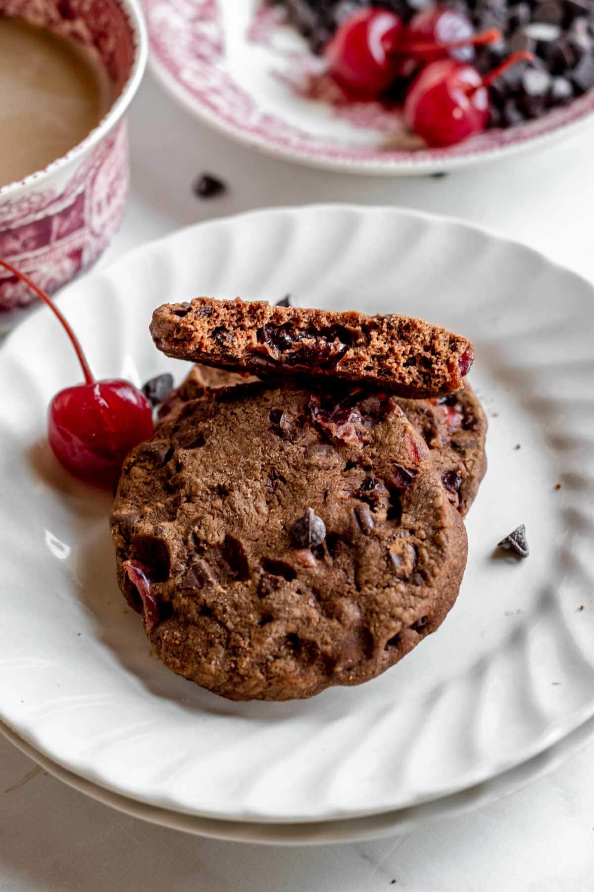 Cherry Chocolate Shortbread Cookies a couple of cookies on plate