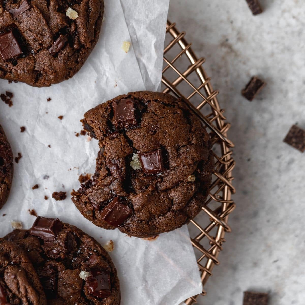 Chocolate Chunk Gingerbread Cookies with a bite taken out